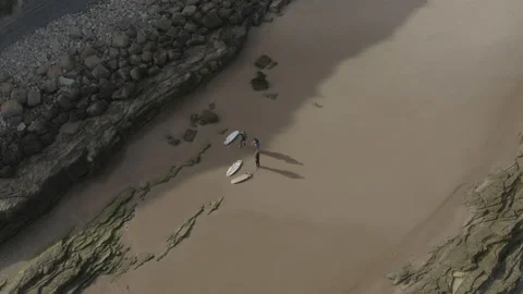 Drone Point of View of Surfers in Spain. Sunrise, 4K Stock Footage 135340796