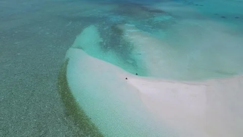 Drone point view of two people at sandbank Stock Footage 305628419
