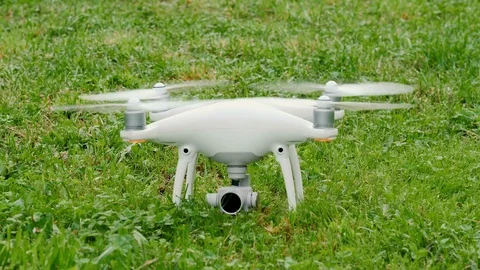 Drone preparing for flight outdoors on grass Stock Footage 94209080