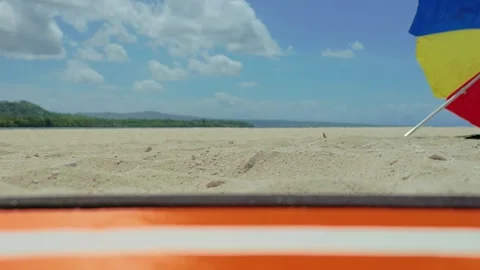 Drone preparing for takeoff on sandy coastal plain Stock Footage 327551306