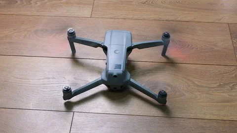 Drone propellers begin spinning while the aircraft remains on the ground 스톡 동영상 336566570