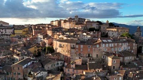 Drone Pull-Away from Historic Italian Old Town Under Dramatic Sky Vídeo Stock 339221474