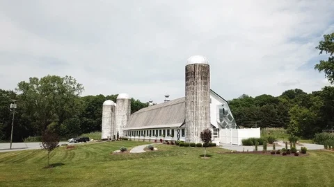Drone pull away from large silver farmhouse Stock Footage 111400372