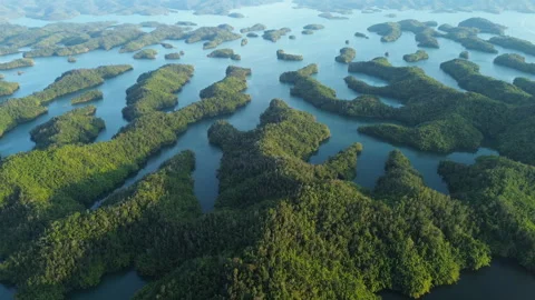 Drone Pull Away over Symmetrical Islands, Ta Dung Lake Central Highlands Vietnam Stock Footage 329915436