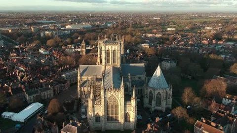 Drone pull away reveal of huge gothic cathedral on summer morning sunrise Stock Footage 168065158