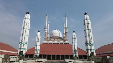 Drone pull away view from the drone highlights the mosque dome Stock Footage 260521262