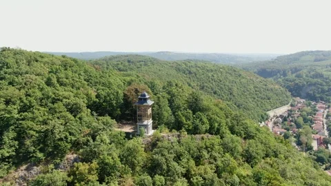 Drone Pull Away from Wooden Observation Tower in Forest Mountains 動画素材 337305356