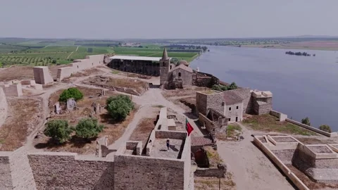 Drone Pull Back and Ascend from Tourist on Juromenha Fortress Tower Stock Footage 333796616