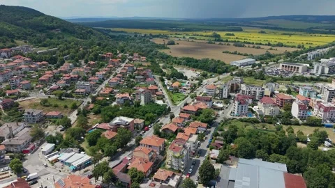 Drone pull back over Obzor landscape and farmland in Bulgaria Stock Footage 344463528