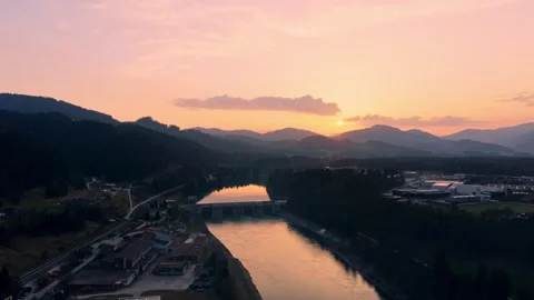 Drone pull back over river valley at sunset Stock Footage 330545952