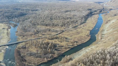 Drone Pull Back Revealing River and Autumn Forest Valley Arxan Stock Footage 330236715