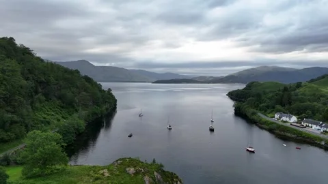 Drone Pull-Back of Sailboats Anchored in Kentallen Bay Scotland Stock Footage 331348269