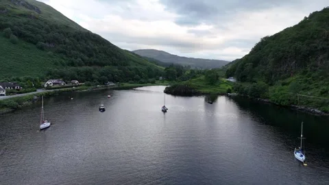 Drone Pull-back From Sailboats to Kentallen Mountain Panorama Stock Footage 331348267