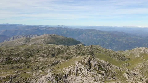 Drone pull back shot above sunny Spanish mountain range Stock Footage 139414602