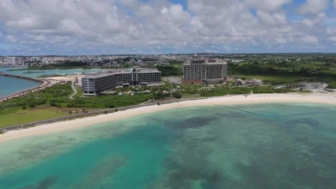 Drone Pull Back Shot of Emerald Ocean and Beach in Miyakojima Okinawa Stock Footage 343354896