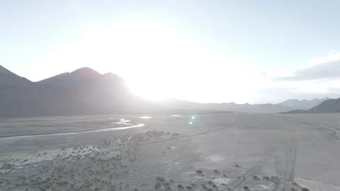 Drone Pull Out Over Vast Ladakh Landscape with River Streams and Sunlit Valleys Stock-Footage 335760701