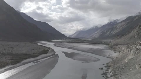 Drone Pull Out Revealing Ladakh River and Beautiful Mountain Valley with Stock Footage 334656681