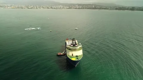 Drone pull-out reveals cable-laying vessel deploying fiber-optic cable off Isla Stock Footage 308361023