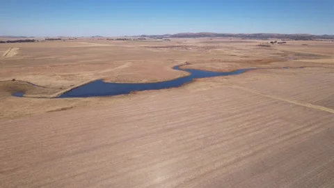 Drone-Pull Up Over Wide Body Of Water Stock Footage 163274866