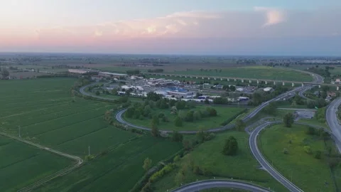 Drone pullback above A1 Autostrada del Sole and A21 junction at Fiorenzuola Vídeo Stock 340604264