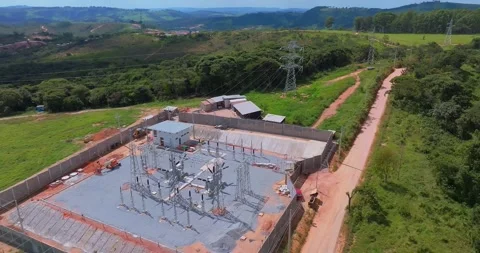 Drone pullback above electrical substation and transmission corridor in Minas Video stock 335137647