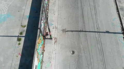 Drone Pullback Above Miami Graffiti Street Scene Video stock 335174542