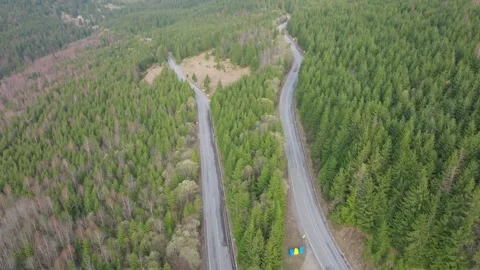 Drone Pullback Above Mountain Road Junction in Rodnei Mountains Romania Vídeos de archivo 336533138