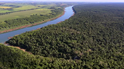 Drone pullback above Parana River bordering Argentina and Paraguay Stock Footage 340918330