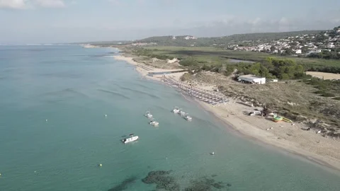 Drone Pullback and Ascend Over Son Bou Beach Revealing Santo Tomás, Menorca Video stock 333009286