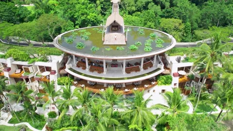 Drone pullback of Bali luxury resort in Ubud Four Seasons Sayan Stock Footage 280810704