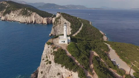 Drone Pullback from Cape Lefkatas Lighthouse Revealing Cliffs Stock-Footage 335979856