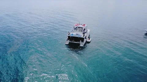 Drone pullback from dive catamaran in Abrolhos Marine National Park Bahia Brazil Video stock 334040186