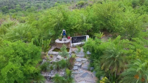 Drone Pullback from Garden Statue in Eco-Village Piplantri Video stock 312365053