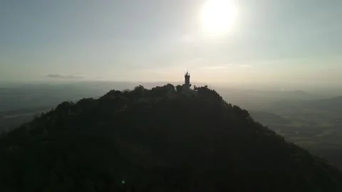 Drone Pullback from Milešovka Mountain, Czech Republic – Alternate Angle Stock Footage 315051875