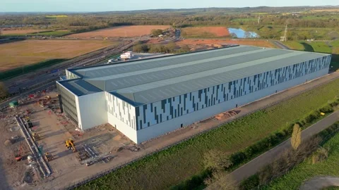 Drone pullback movement of an industrial unit currently being built Stock Footage 332510167