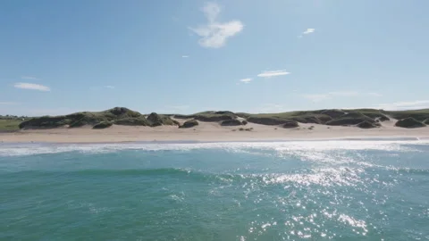 Drone pullback over Eoropie Beach and dunes, Isle of Lewis, Outer Hebrides Stock Footage 320454420