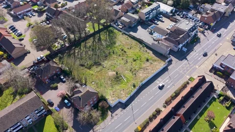 Drone pullback over former Texaco petrol station site in Cheshunt Video stock 333346462