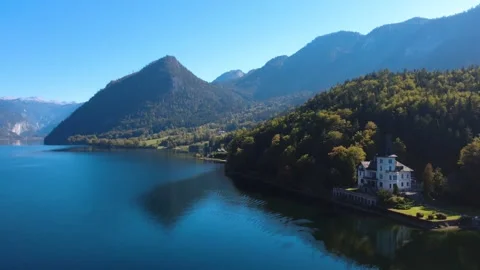 Drone Pullback over Lake Grundlsee with Historic Villa Roth Video stock 347395507