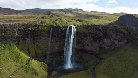 Drone Pullback Over Seljalandsfoss Waterfall, Iceland 4K UHD Stock Footage 316646590