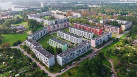 Drone pullback over Tosmare district near industrial port Liepaja Stock-Footage 333437973