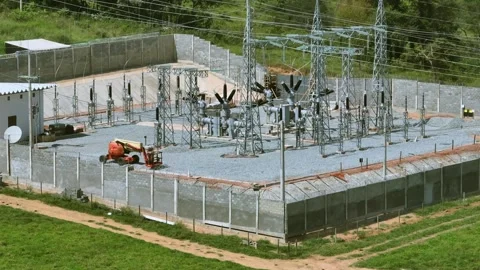 Drone pullback parallax above electrical substation in Minas Gerais Brazil Stock Footage 335181808