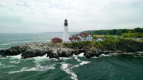 Drone Pullback from Portland Maine Lighthouse Over Atlantic Coast | 4K Aerial Stock-Footage 314026415