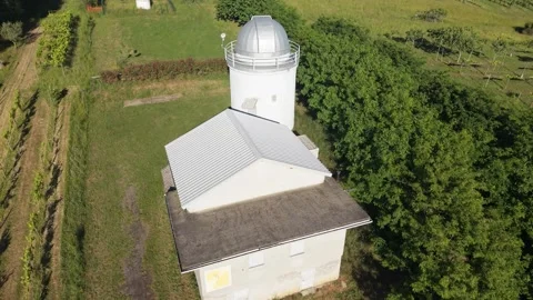 Drone Pullback Reveal From Observatory Over Vineyards at Sunset Video stock 334940411
