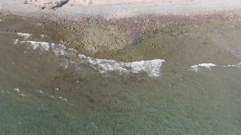 Drone Pullback Reveal from Rocky Shore to Meloneras Resorts, Gran Canaria, Spain Stock Footage 333008923
