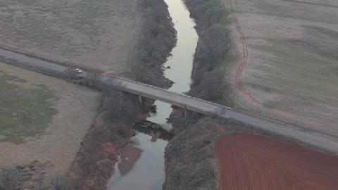 Drone Pullback Reveal Truck Crossing Rural Bridge Over Creek Oklahoma Stock Footage 330128438