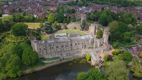 Drone Pullback Reveal of Warwick Castle Dungeon on a Sunny Day Stock Footage 331202583