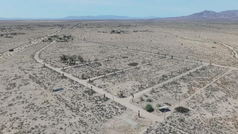 Drone Pullback Revealing Palm-Lined Street Grid in Salton City California Stock-Footage 332683292