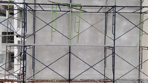 Drone Pullback from Scaffolding and Building Under Construction Vídeos de archivo 337623268