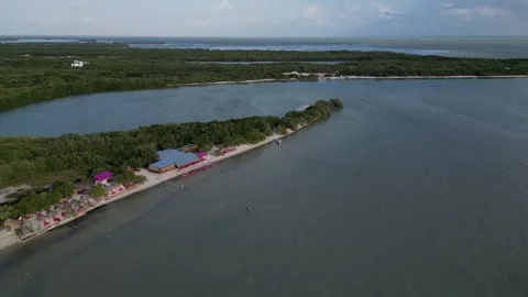 Drone Pullback Showing Mountains Meeting the Open Ocean  Vídeos de archivo 321418959