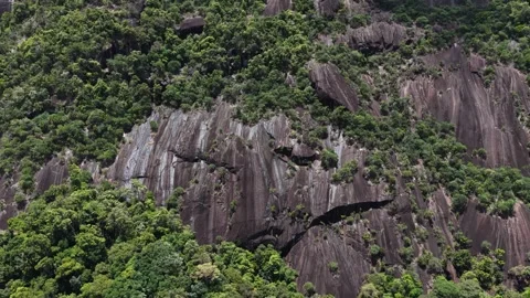 Drone Pullback from Yang Hanh Mountain Rock Formation, Dak Lak, Vietnam Stock Footage 343806857